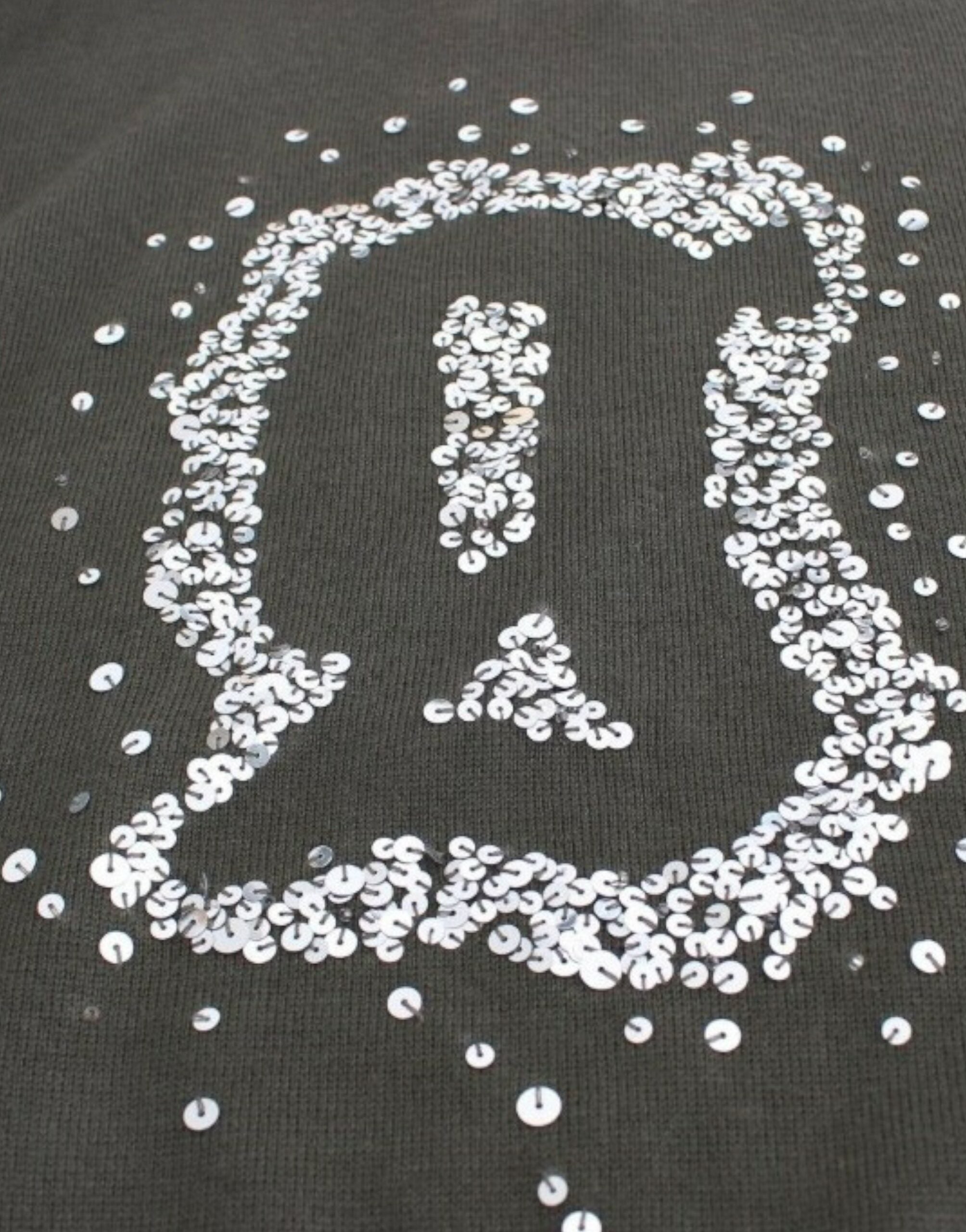 Green wool turtleneck sweater