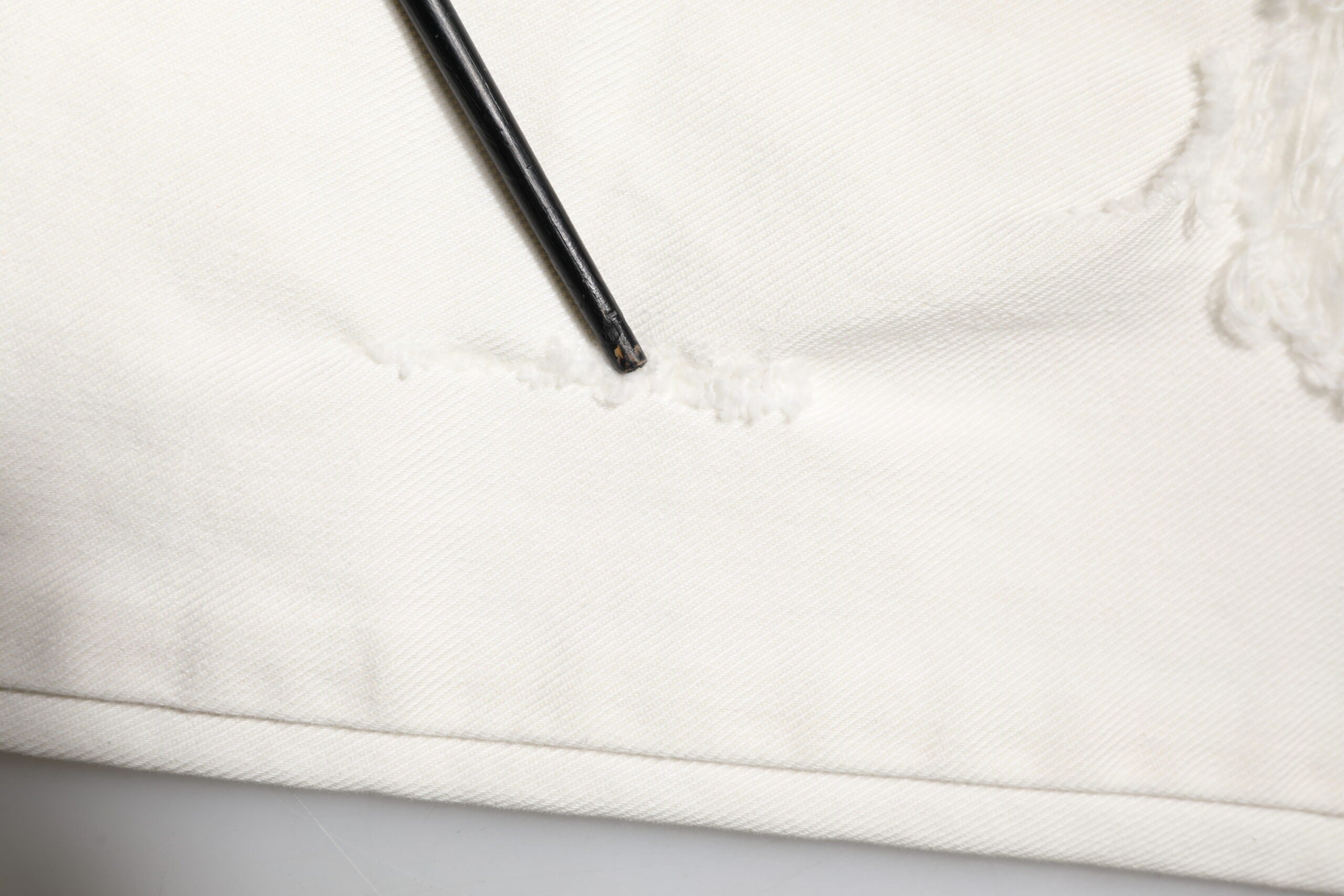 White Tattered Graffiti Skinny Denim Jeans